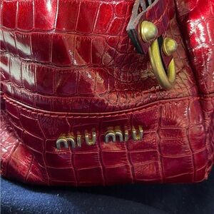Red leather miu miu bag